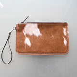 cow skin pouch at Marie Dooley Maison